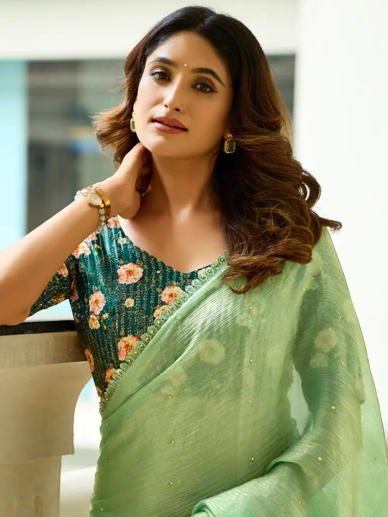 green-embellished-mono-satin-saree (1).webp